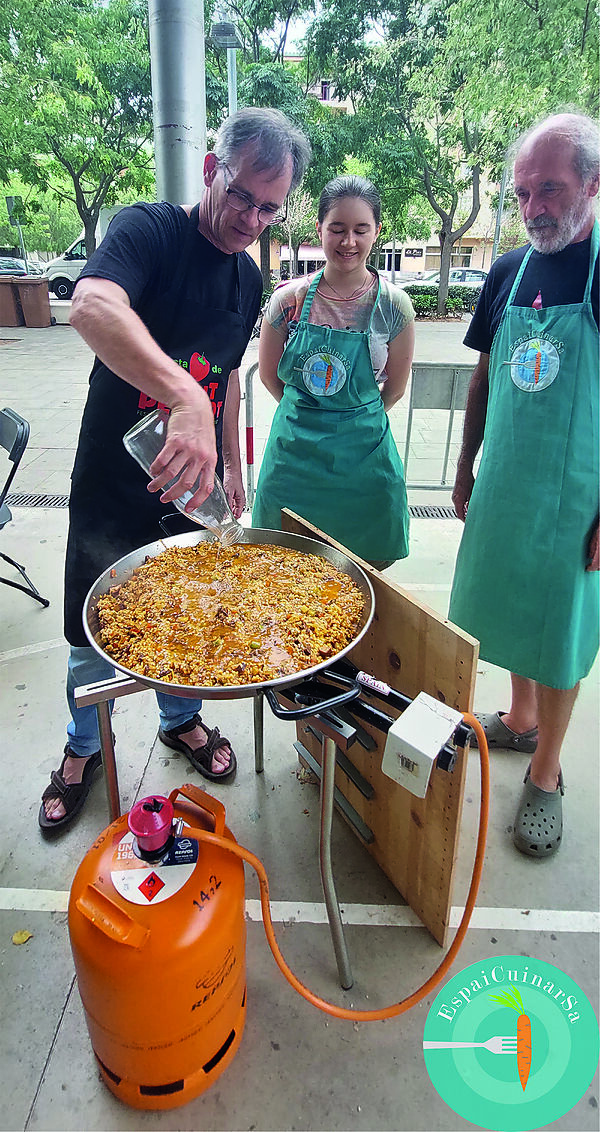 Mostra de arroces en la Fiesta de Santo Pimiento, barrio de Santa Eugènia